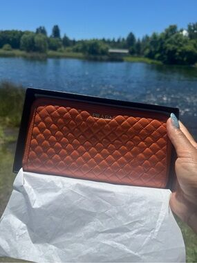 #108 Prada Quilted Orange Zip-Around Leather Wallet